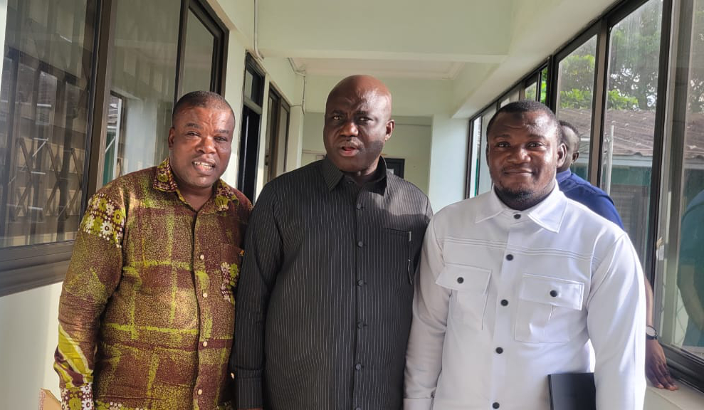 10 minister of agriculture in the midlle, and immidiate right is the feed ghana national coordinator, aand lkeft is the executive director for savannah woye lbg
